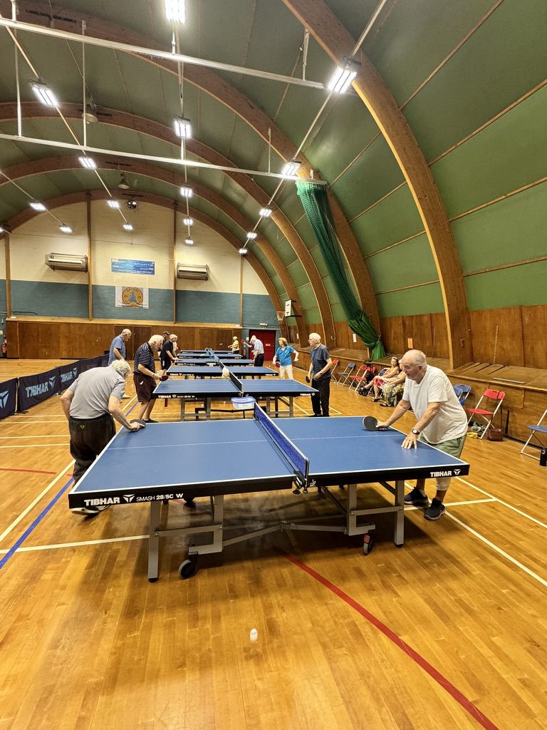 Group session underway at Harlow Parkinson's table tennis