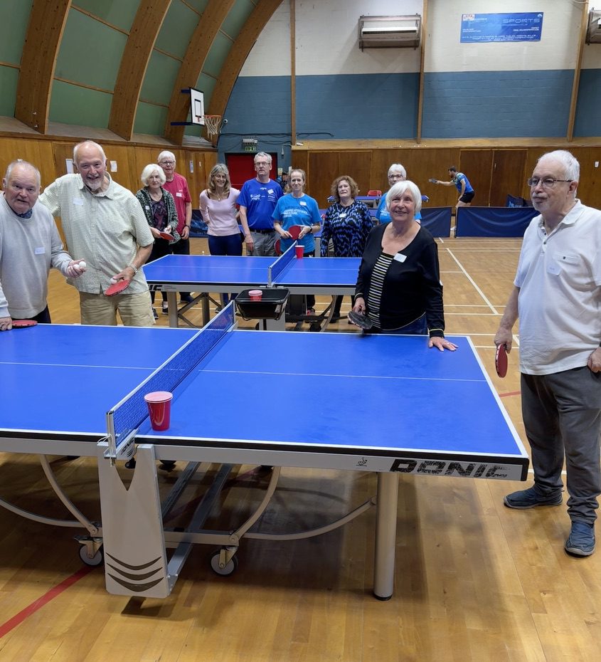 People with Parkinson's enjoying a table tennis session